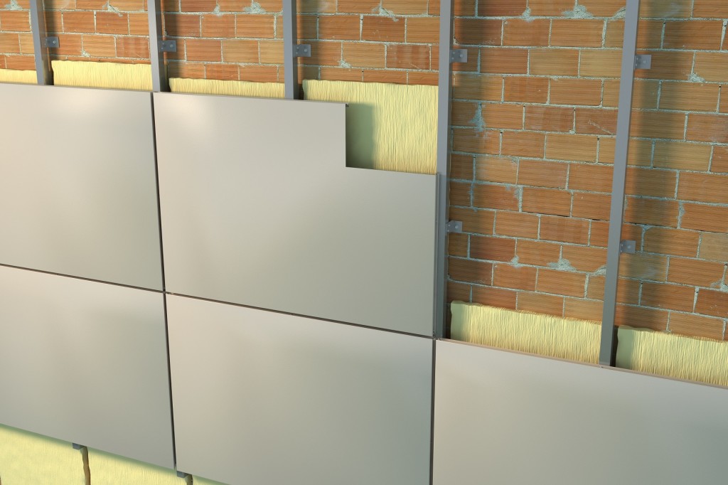 Instalación de paneles mediante sistema de fachada ventilada.